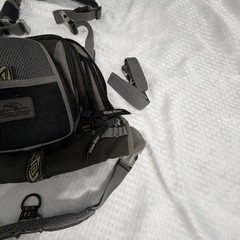 White River Fly fishing sling packs featuring multiple zippered compartments