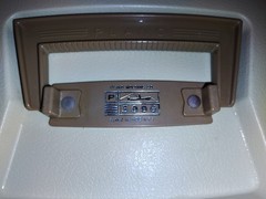 vintage Plano 5000 two-tier tackle box in a tan and brown color scheme.