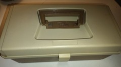 vintage Plano 5000 two-tier tackle box in a tan and brown color scheme.