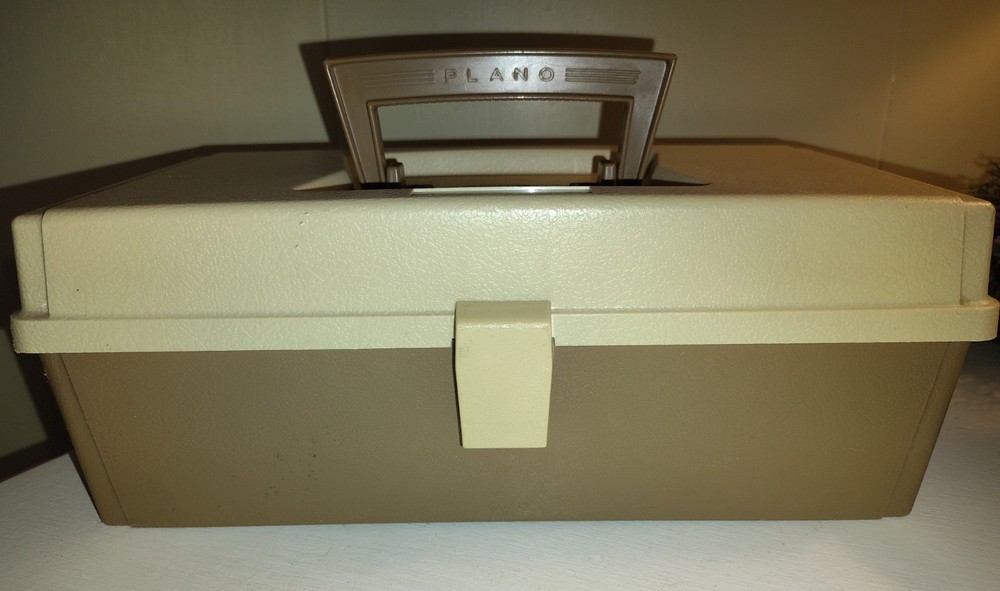 vintage Plano 5000 two-tier tackle box in a tan and brown color scheme.