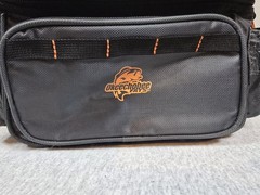 grey and black Okeechobee Fats Inland Series fishing tackle bag with orange…